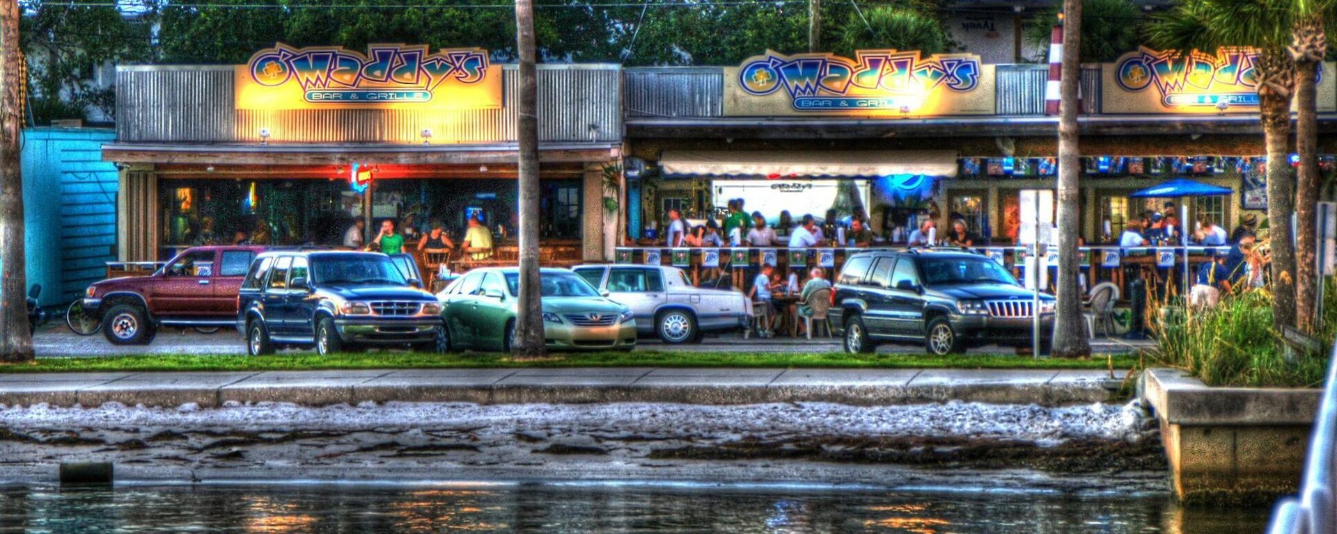 An older photo of O'Maddy's seen from across the water