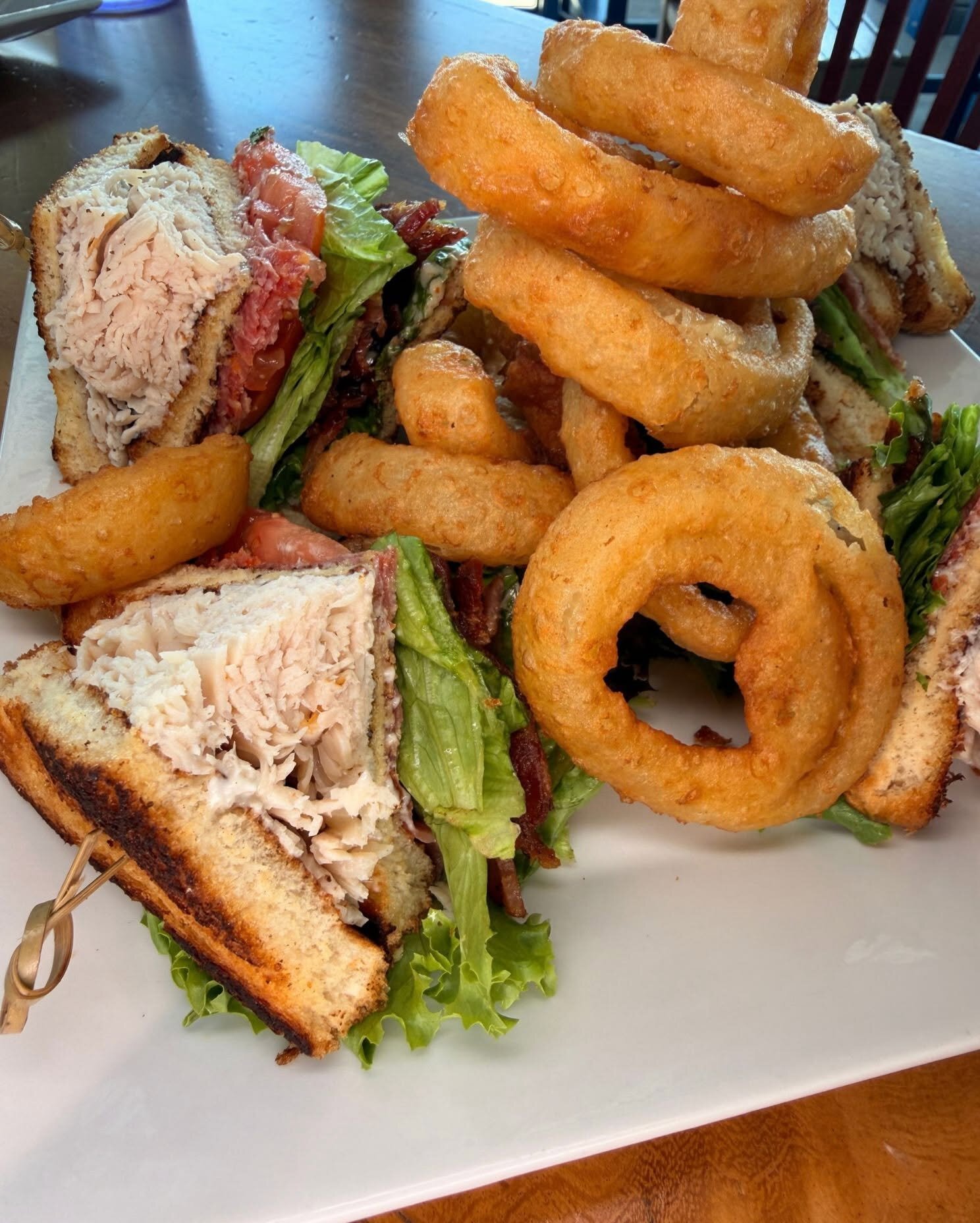 A five-meat club with onion rings