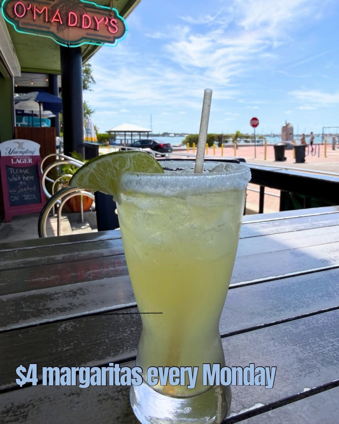 A margarita on the O'Maddy's rail, looking across Shore Blvd to the Gulfport pier